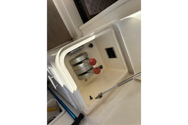 Slide: The Image of Compartment of 1996 Ocean Yachts 48 Super Sport with mechanical components visible. - 32