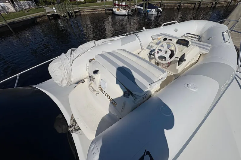 Slide: The Image of 1996 Ocean Yachts 48 Super Sport boat interior with steering wheel and seating. - 36