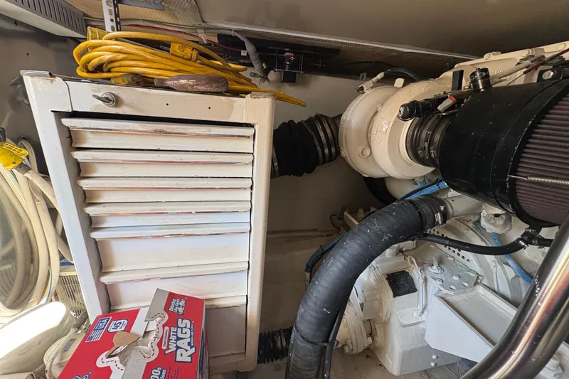 Slide: The Image of Engine room of a 1996 Ocean Yachts 48 Super Sport with tools and equipment. - 41