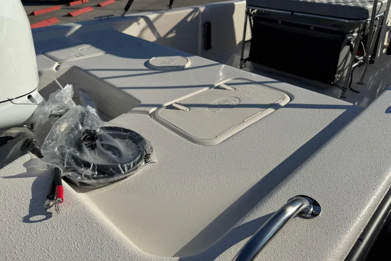 Slide: The Image of 2026 Carolina Skiff E20 JVX CC boat interior with steering console and seating. - 10