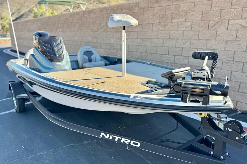 Slide: The Image of 2019 Nitro Z17 fishing boat on trailer, parked outdoors. - 1