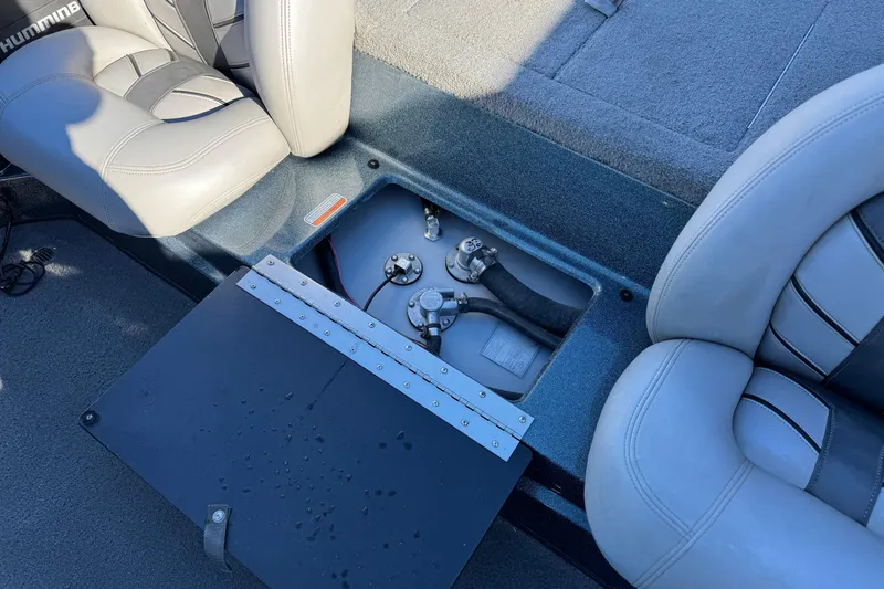 Slide: The Image of Interior of 2019 Nitro Z17 boat showing open compartment between seats. - 15