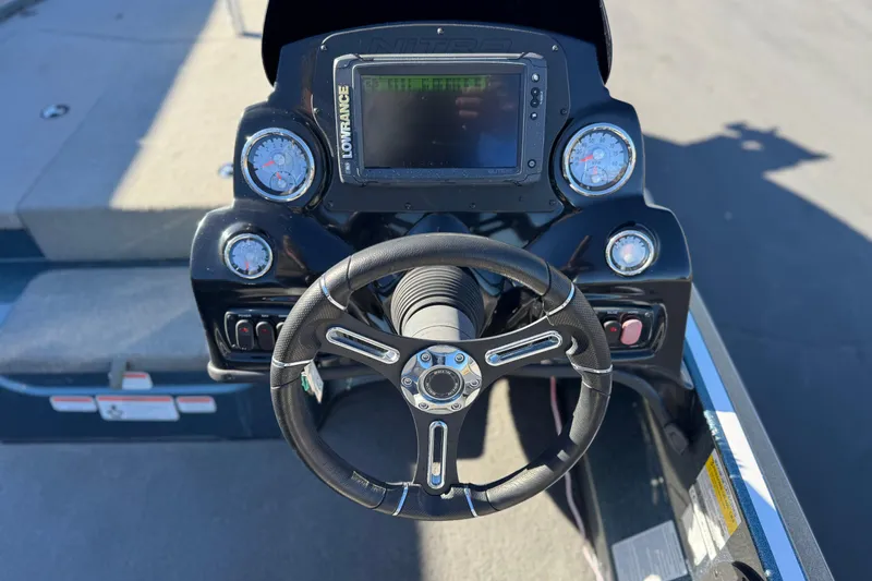 Slide: The Image of Steering console of a 2019 Nitro Z17 boat with gauges and a Lowrance display. - 20