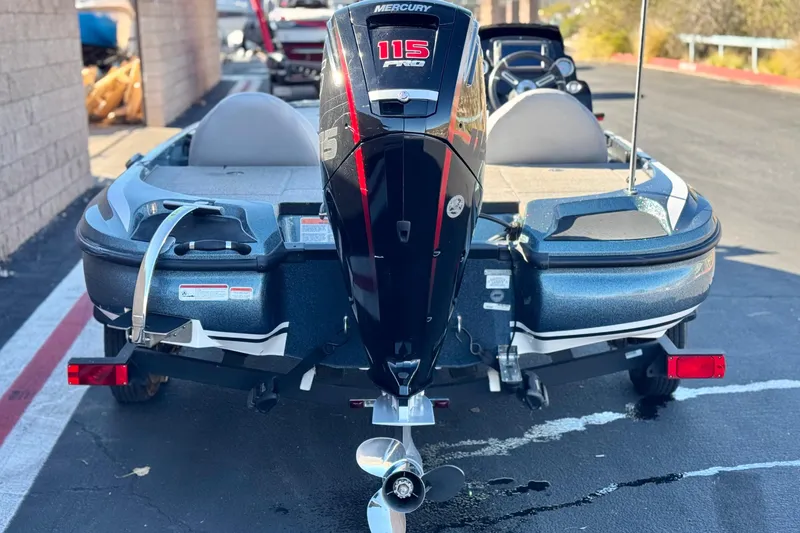 Slide: The Image of 2019 Nitro Z17 boat with Mercury 115 Pro XS engine, parked on a trailer. - 4