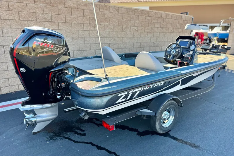Slide: The Image of 2019 Nitro Z17 boat with Mercury Pro XS engine, parked on a trailer. - 5