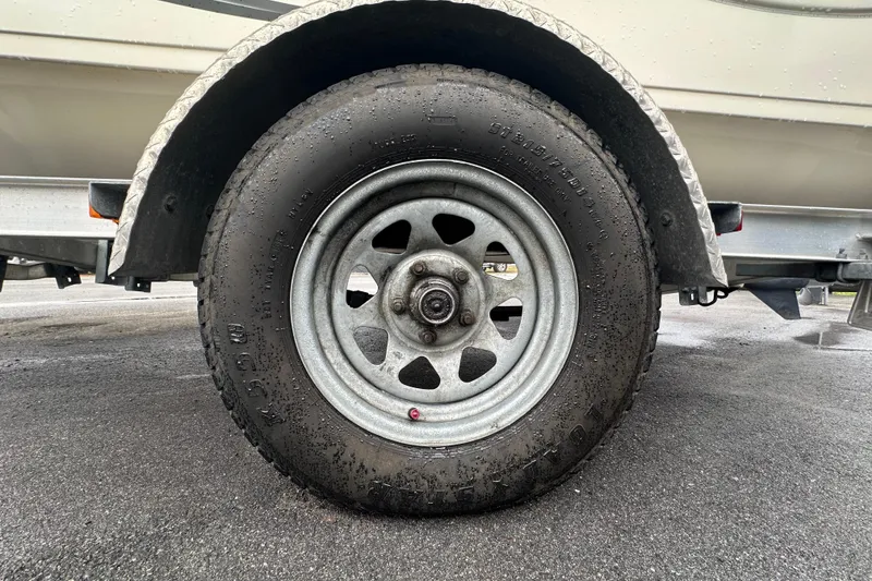 Slide: The Image of Simrad display on 2016 Carolina Skiff 218 DLV boat, with sale sign in background. - 21