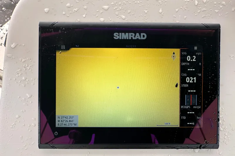 Slide: The Image of 2016 Carolina Skiff 218 DLV interior compartment with wiring and fire extinguisher. - 26
