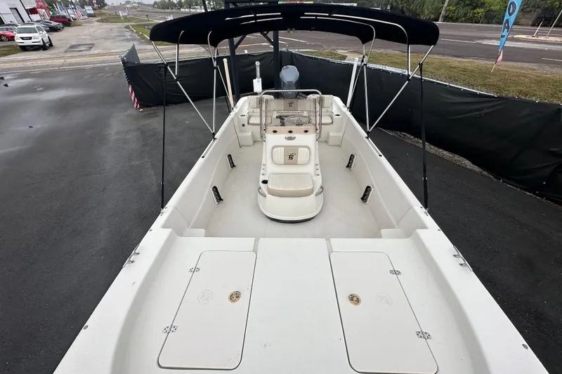 Slide: The Image of Open storage compartment on a 2016 Carolina Skiff 218 DLV boat. - 31