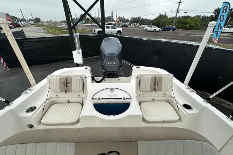 Slide: The Image of 2016 Carolina Skiff 218 DLV boat deck with storage hatch and textured surface. - 35