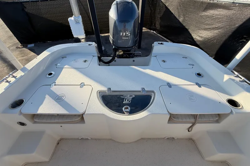 Slide: The Image of 2016 Carolina Skiff 218 DLV boat deck with Yamaha 115 outboard motor. - 48