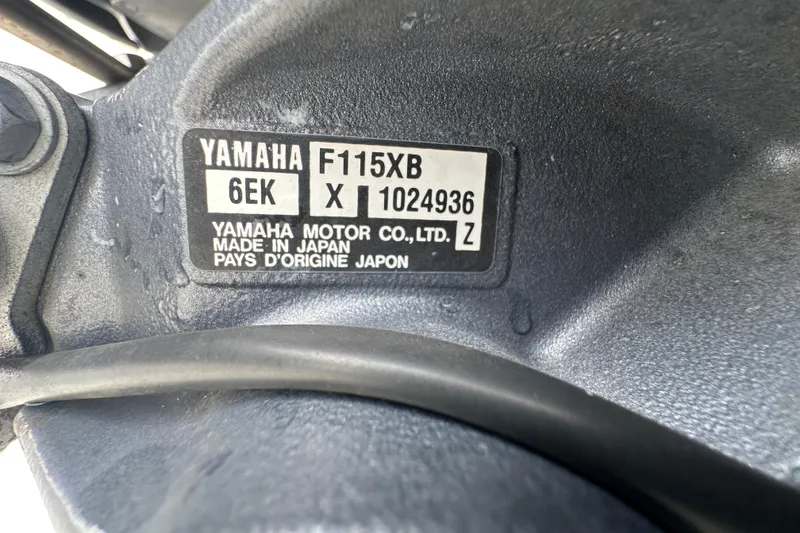 Slide: The Image of 2016 Carolina Skiff 218 DLV boat propeller close-up on trailer. - 6