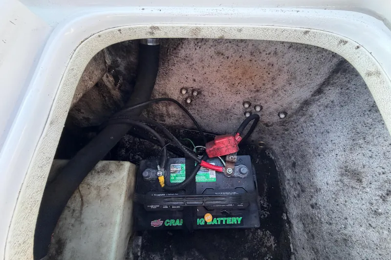 Slide: The Image of Battery compartment of a 2016 Carolina Skiff 218 DLV boat. - 64