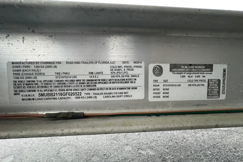 Slide: The Image of Label on 2016 Carolina Skiff 219 DLV trailer, detailing specifications and load capacity. - 69