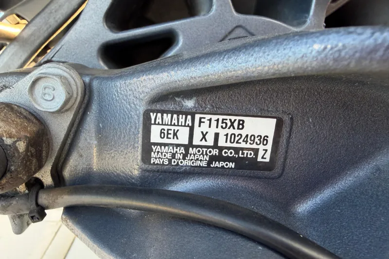 Slide: The Image of Yamaha F115XB engine label on 2016 Carolina Skiff 218 DLV boat. - 70