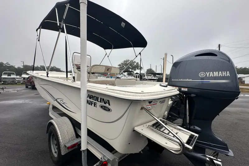 Slide: The Image of 2016 Carolina Skiff 218 DLV boat with Yamaha engine on trailer, outdoor display. - 8