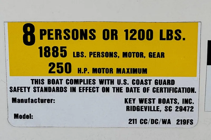 Slide: The Image of Capacity label for 2016 Key West 211 Dual Console boat, 8 persons or 1200 lbs. - 32