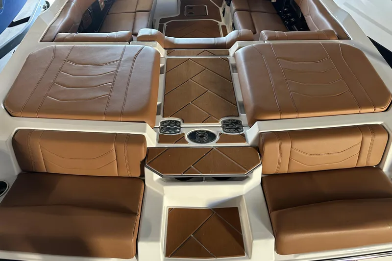 Slide: The Image of 2026 Malibu Wakesetter 23 LSV interior with luxurious brown leather seating and modern design. - 4