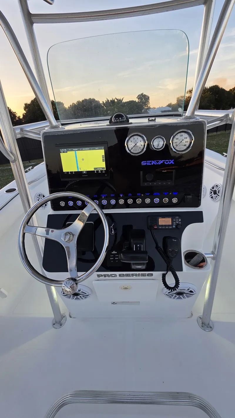 Slide: The Image of 2008 Sea Fox 216 boat console at sunset. - 6