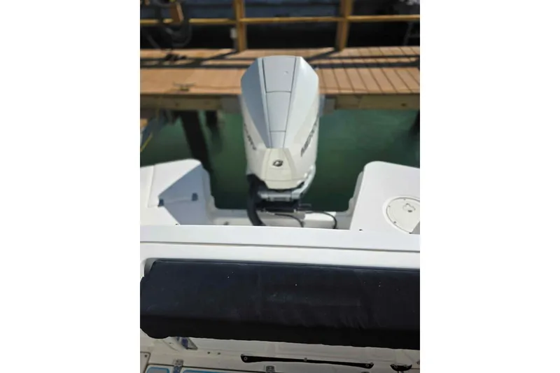 Slide: The Image of 2021 Boston Whaler 240 Vantage boat engine at dockside. - 16