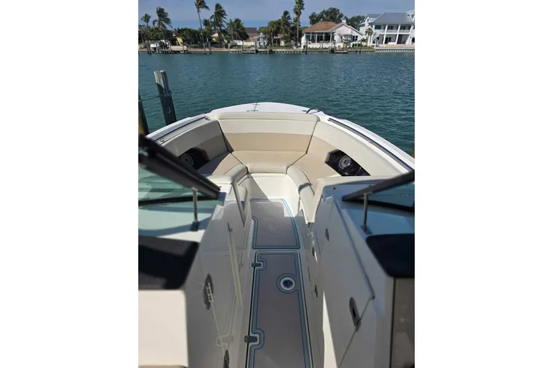 Slide: The Image of 2021 Boston Whaler 240 Vantage boat interior with waterfront view. - 25