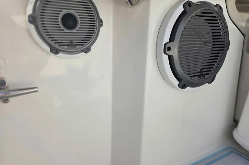 Slide: The Image of Speakers on a 2021 Boston Whaler 240 Vantage boat interior. - 27