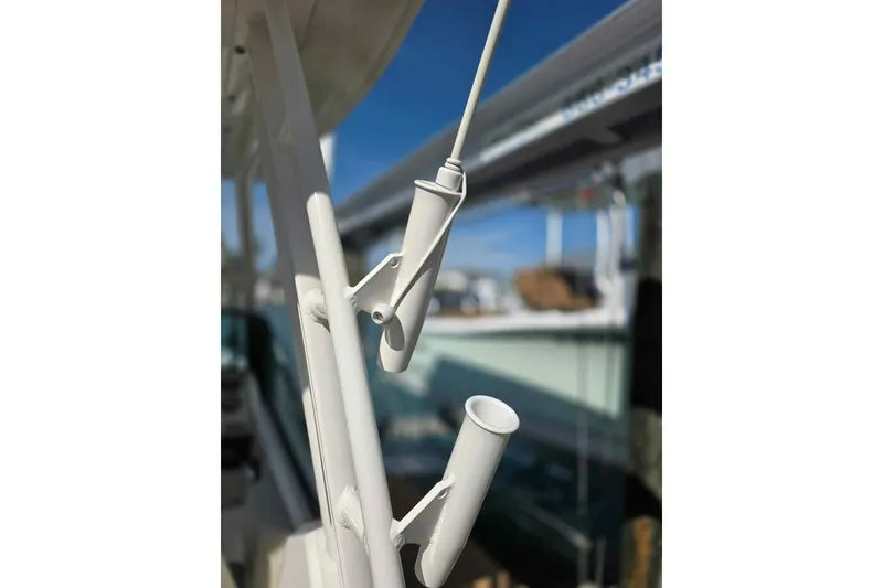 Slide: The Image of Close-up of rod holders on a 2021 Boston Whaler 240 Vantage boat. - 29