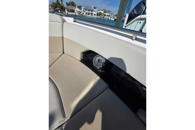 Slide: The Image of Interior seating of 2021 Boston Whaler 240 Vantage boat with speaker detail. - 36