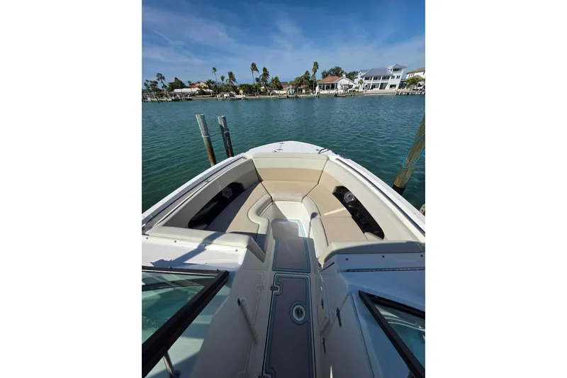 Slide: The Image of 2021 Boston Whaler 240 Vantage boat interior with waterfront view. - 37