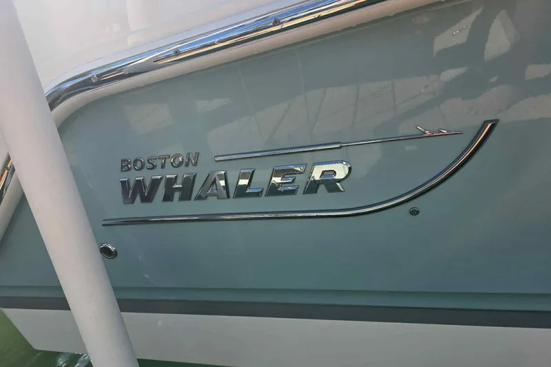 Slide: The Image of Boston Whaler 240 Vantage 2021 boat logo on sleek hull. - 47