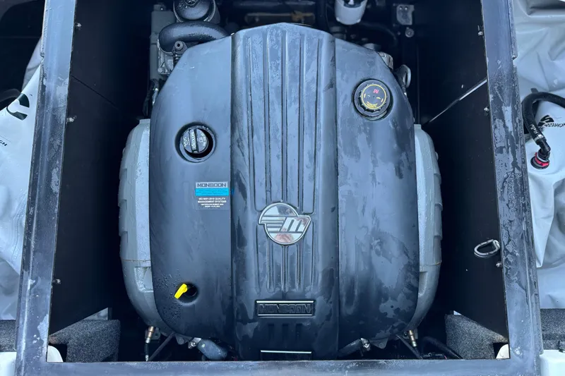 Slide: The Image of 2023 Axis T220 engine compartment showcasing Monsoon engine components. - 20