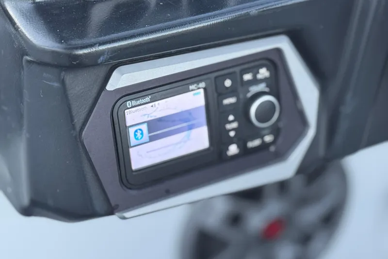 Slide: The Image of Close-up of 2023 Axis T220 Bluetooth control panel with display screen. - 27