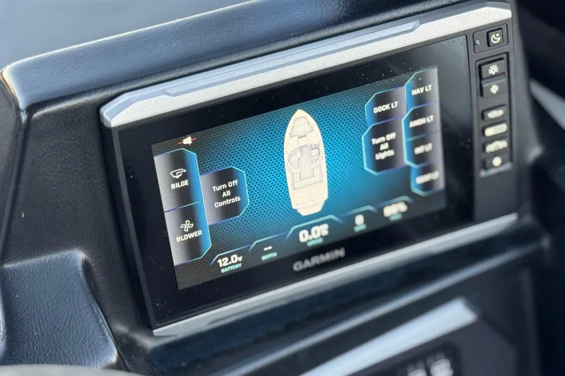 Slide: The Image of Touchscreen display in 2023 Axis T220 boat showing navigation and control options. - 29