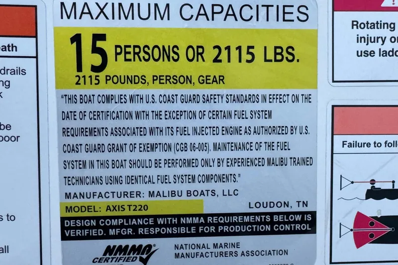 Slide: The Image of Axis T220 boat capacity label, 15 persons or 2115 lbs, 2023 model compliance. - 35