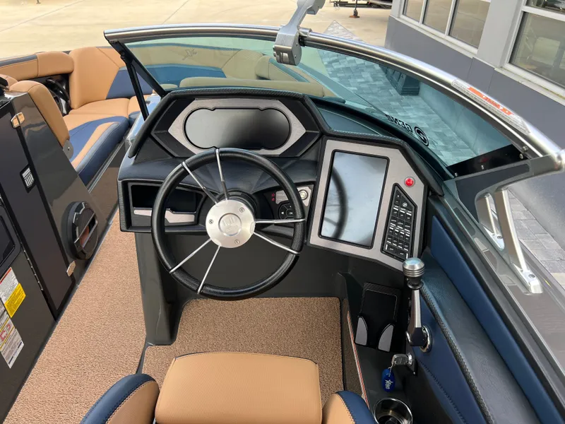 Slide: The Image of Interior view of 2019 MasterCraft XStar boat cockpit. - 17