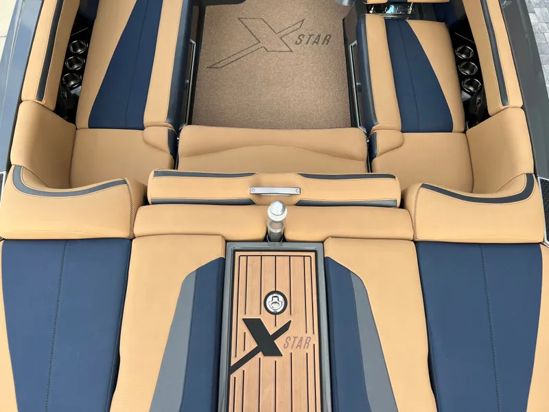 Slide: The Image of Interior of a 2019 MasterCraft XStar boat with luxurious seating. - 28