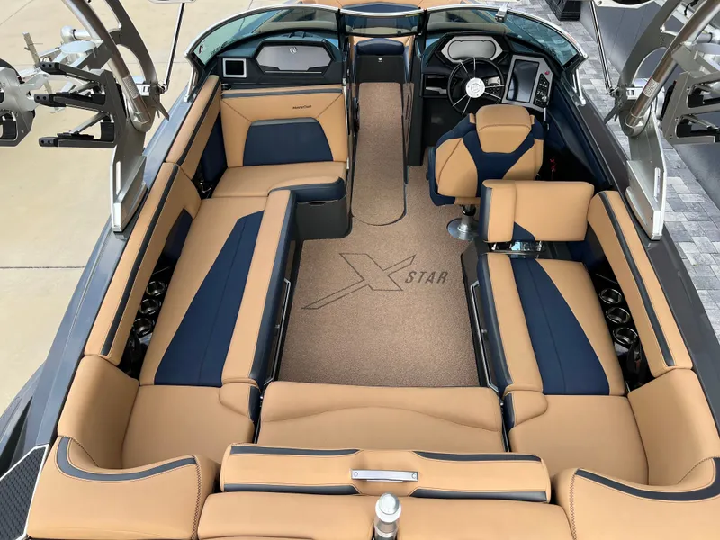 Slide: The Image of Interior of a 2019 MasterCraft XStar boat with luxurious seating. - 29