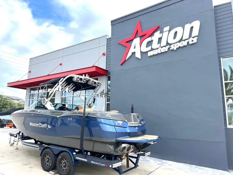 Slide: The Image of 2019 MasterCraft XStar in front of Action Water Sports building. - 3
