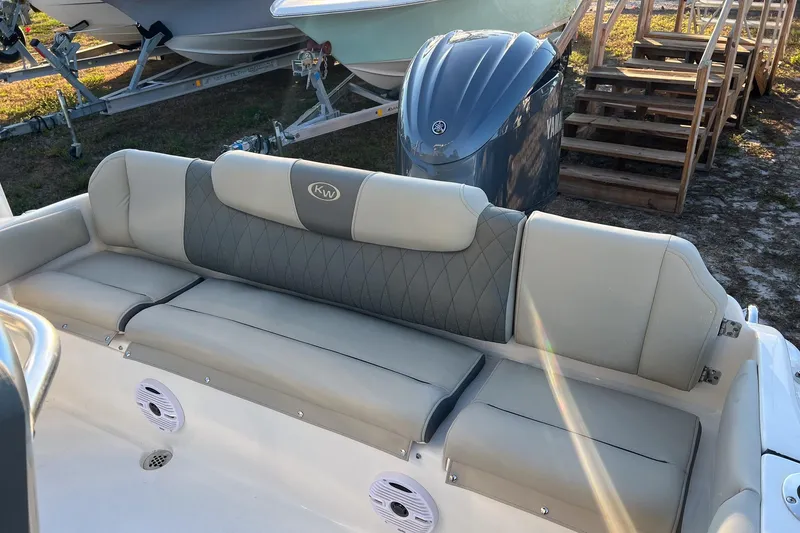Slide: The Image of 2026 Key West 219 FS boat interior seating with elegant upholstery design. - 16