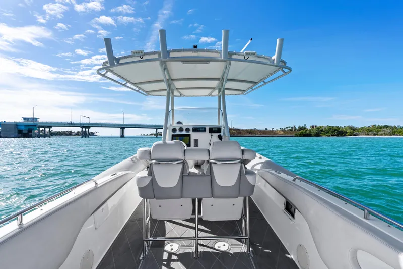 Slide: The Image of Airship 330 boat interior with ocean view, 2014 model, under clear blue sky. - 14