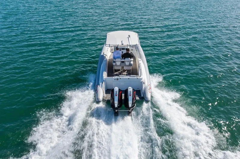 Slide: The Image of Aerial view of 2014 Airship 330 boat cruising on open water. - 3