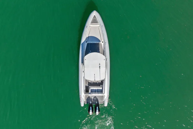 Slide: The Image of Aerial view of 2014 Airship 330 boat on green water. - 4