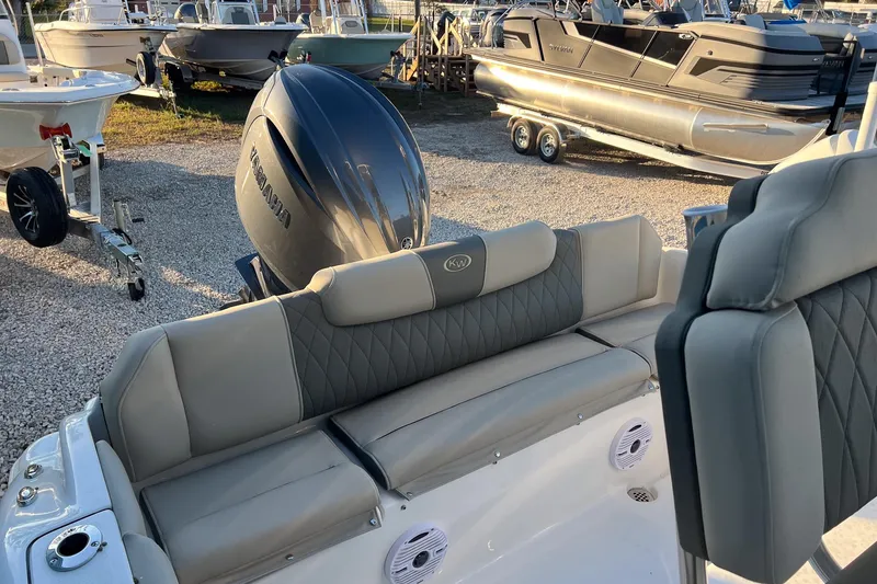 Slide: The Image of 2026 Key West 219 FS boat interior with Yamaha engine, featuring comfortable seating. - 20