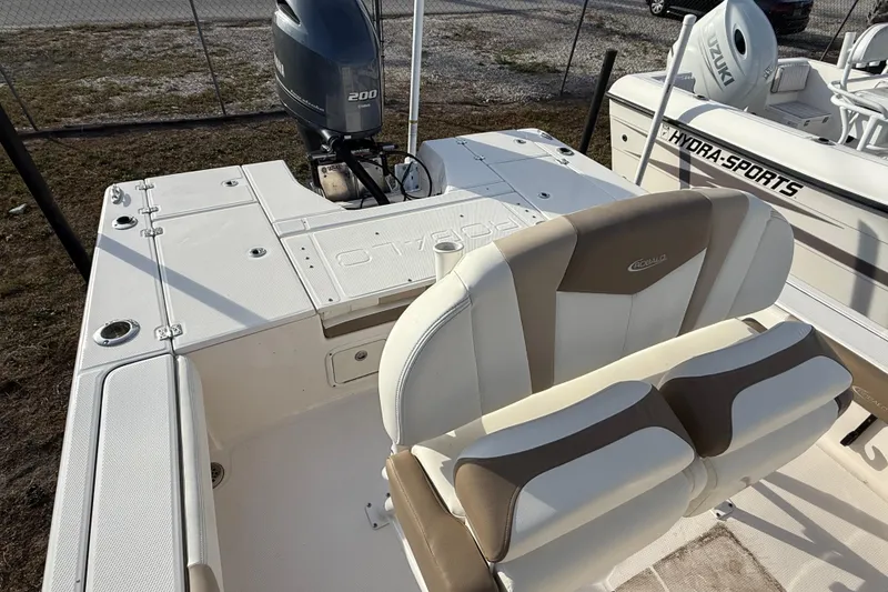 Slide: The Image of 2023 Robalo 226 Cayman boat with Yamaha 200 engine, featuring comfortable seating and spacious deck. - 5