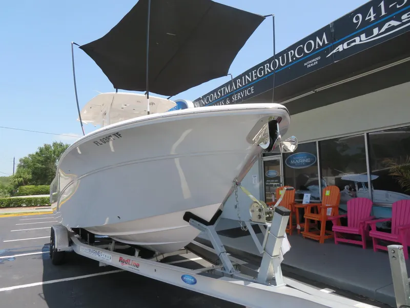 Slide: The Image of 2022 Sea Fox 268 Commander on trailer outside a store. - 19