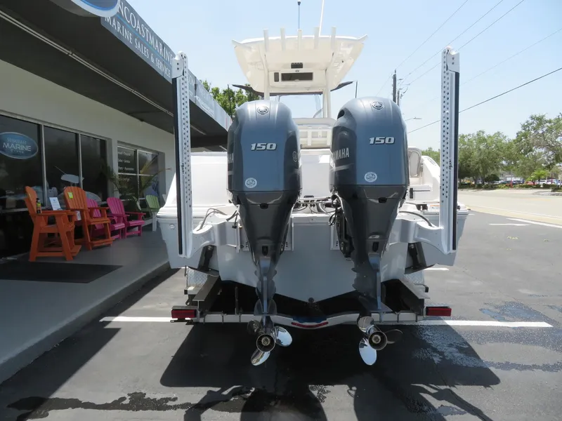 Slide: The Image of Rear view of 2022 Sea Fox 268 Commander with twin Yamaha 150 engines. - 21