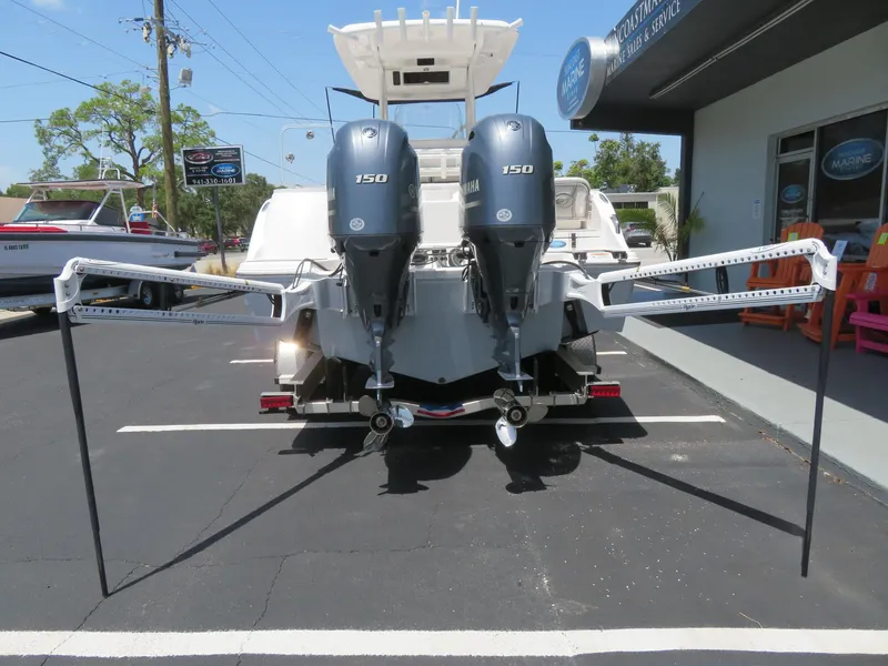Slide: The Image of Rear view of a 2022 Sea Fox 268 Commander with dual outboard engines. - 22