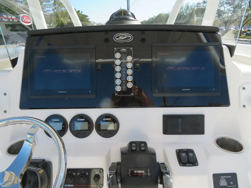 Slide: The Image of Dashboard of 2022 Sea Fox 268 Commander with controls and screens. - 47