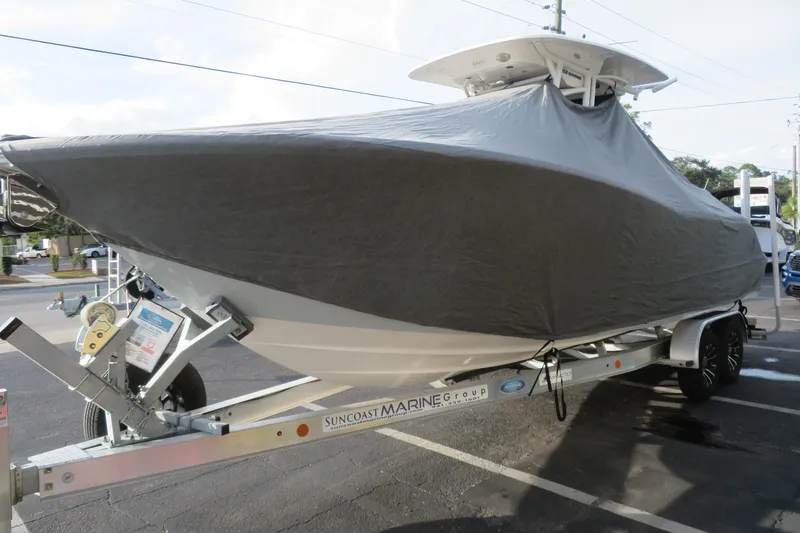 Slide: The Image of 2022 Sea Fox 268 Commander boat covered on a trailer in a parking lot. - 78