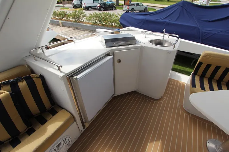 Slide: The Image of Luxurious 2006 Navigator 5400 yacht flybridge aft view - 19