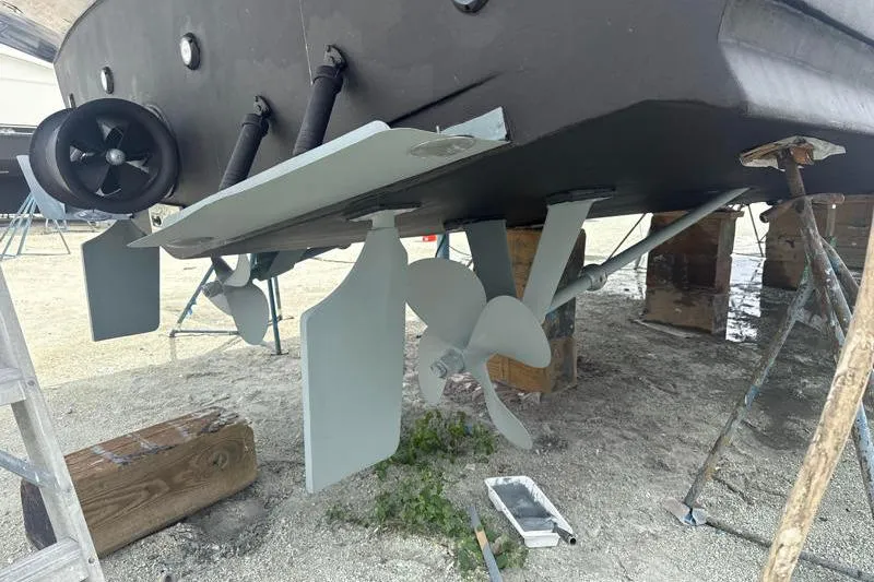 Slide: The Image of Bottom view of a 2006 Navigator 5400 yacht showing propellers and rudders. - 39